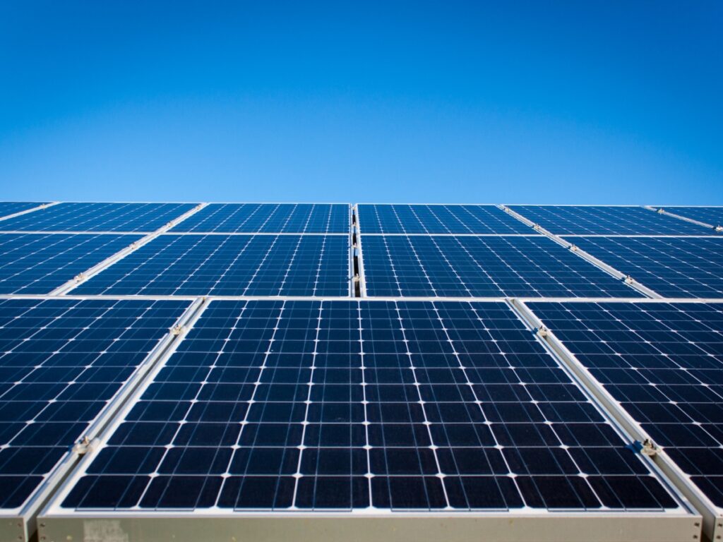 All-Electric Home Guide for Sunshine Coast 10 Rows of solar panels set against a clear blue sky in Brisbane, capturing sunlight for renewable energy generation across the Sunshine Coast.