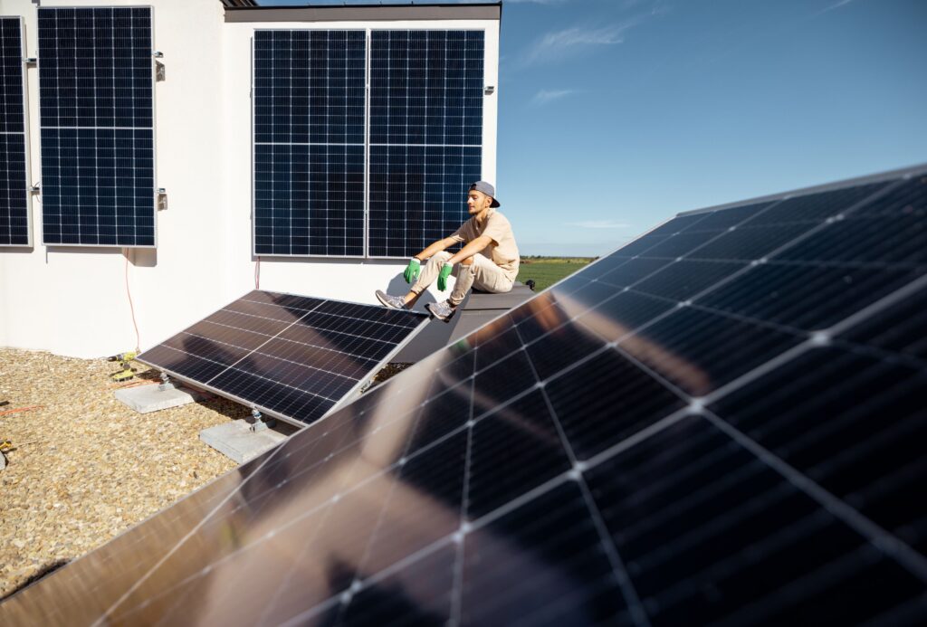 Ground-mounted solar panel installation on open land, showcasing scalable renewable energy solutions for larger properties.