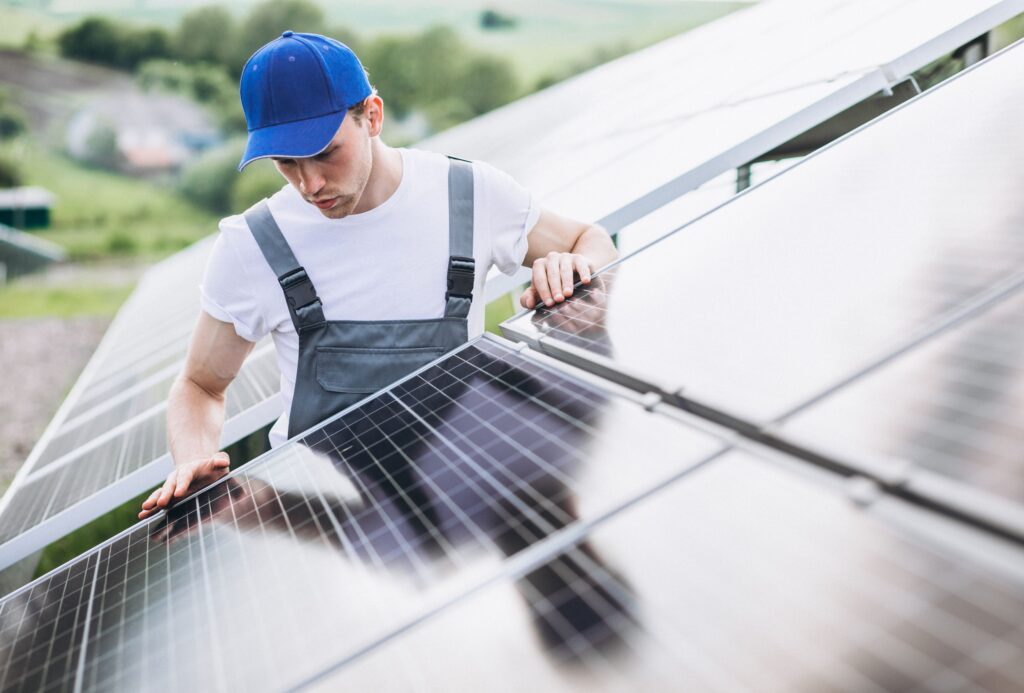 Solar Health Check & Clean North Brisbane: Safety & Performance 3 Solar technician cleaning solar panels on a rooftop on the Sunshine Coast, ensuring optimal performance through professional maintenance.